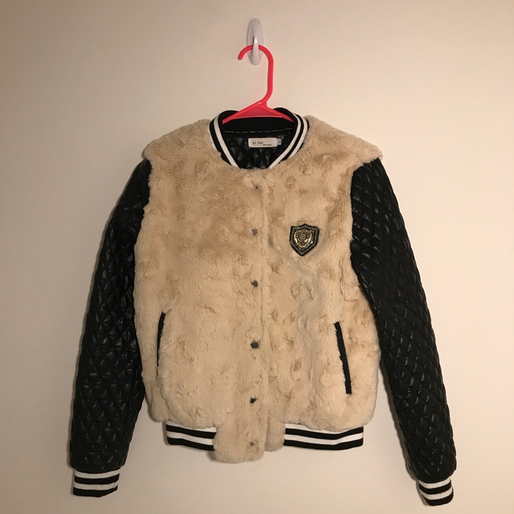 Faux fur bomber jacket with leather sleeves
